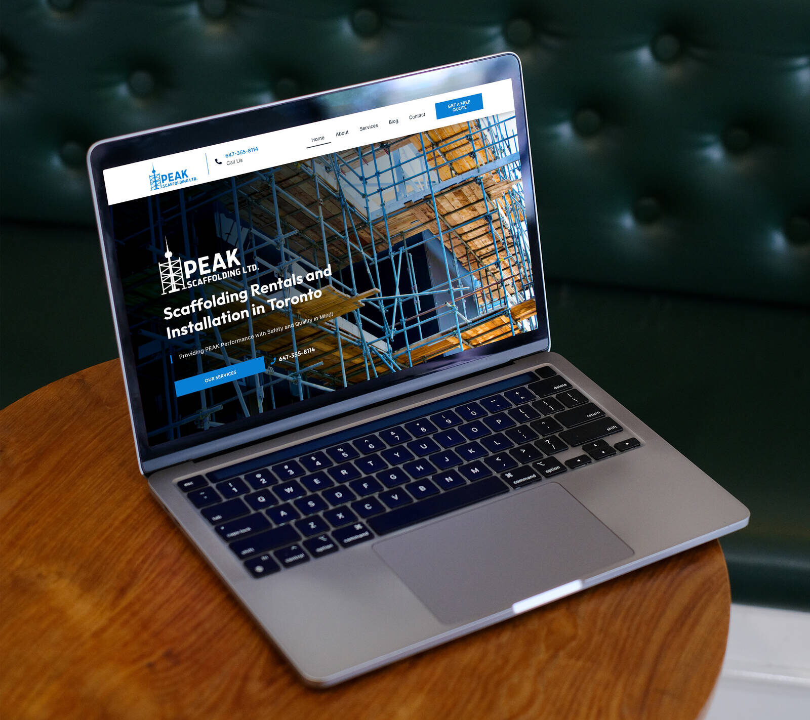 PEAK Scaffolding website on a MacBook